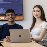 Photo of Sidonie Dessoubret, a junior in information science, and Jeremi Lukos, a junior in architecture and urban planning, who won $1,000 in a UWM pitch contest in March for Insite, a platform designed to make construction projects simpler to manage. (UWM Photo/Troye Fox)