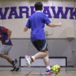 Photo of soccer players scrimmaging in Frank Holt Gymnasium at the UW-Whitewater Rock County campus on April 18, 2024. (UW-Whitewater photo/Craig Schreiner)
