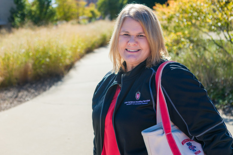 Photo of "Mama Erin" - In her role as an assistant director in the Division of University Housing, Erin Warner helps students negotiate Madison’s complex and sometimes anxiety-inducing housing market. Photo by Joel Ninmann/University Housing