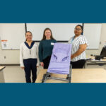 Photo of UW-Platteville engineering students with Gentle Jumps toddler chair they designed