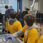 Photo of local middle school students learning about PFAS during a workshop at UW-Stevens Point's STEAM Day.