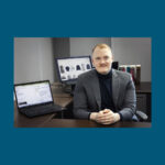 Photo of Scott Schanke, an assistant professor in UWM’s Lubar College of Business, who studies the design of artificial intelligence agents for public-facing business interactions, and how different interfaces can make or break consumer trust. (UWM Photo/Elora Hennessey)