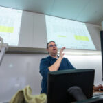 Photo of UWO Professor and Economics Department Chair Benjamin Artz at the head of the class in the spring 2025 Economics 472: Time Series Analysis and Forecasting course. UWO launches a new Business Analytics major in fall.