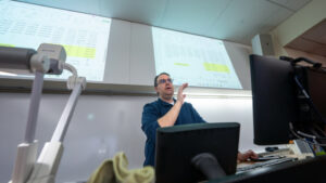 Photo of UWO Professor and Economics Department Chair Benjamin Artz at the head of the class in the spring 2025 Economics 472: Time Series Analysis and Forecasting course. UWO launches a new Business Analytics major in fall.