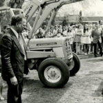 Photo of a crowd of onlookers watching as the Centennial Time Capsule is lowered into the ground on May 13, 1975. UWRF Archives.