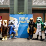 Photo of mascots: Campaign will emphasize value of college, its long-term impact on individuals, regional economy.
