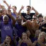 Photo of UW-Whitewater fans in purple