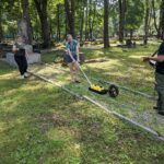 Photo: Dr. Harry Jol, professor of geography, and a team of research students are featured in a National Geographic documentary that highlights the team’s use of ground-penetrating radar to locate mass graves of the Holocaust at sites across Eastern Europe.