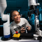 Photo of UWM student Georgina Monese, who is pursuing her bachelor's in biomedical engineering, driven to use new technology to help people and improve medicine. (UWM Photo/Troye Fox)