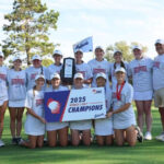 Photo: The UW-Stout women's golf team celebrates their victory at the WIAC Championship. / Photo by Steve Frommell