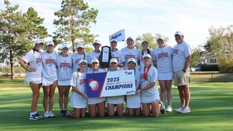 Photo: The UW-Stout women's golf team celebrates their victory at the WIAC Championship. / Photo by Steve Frommell