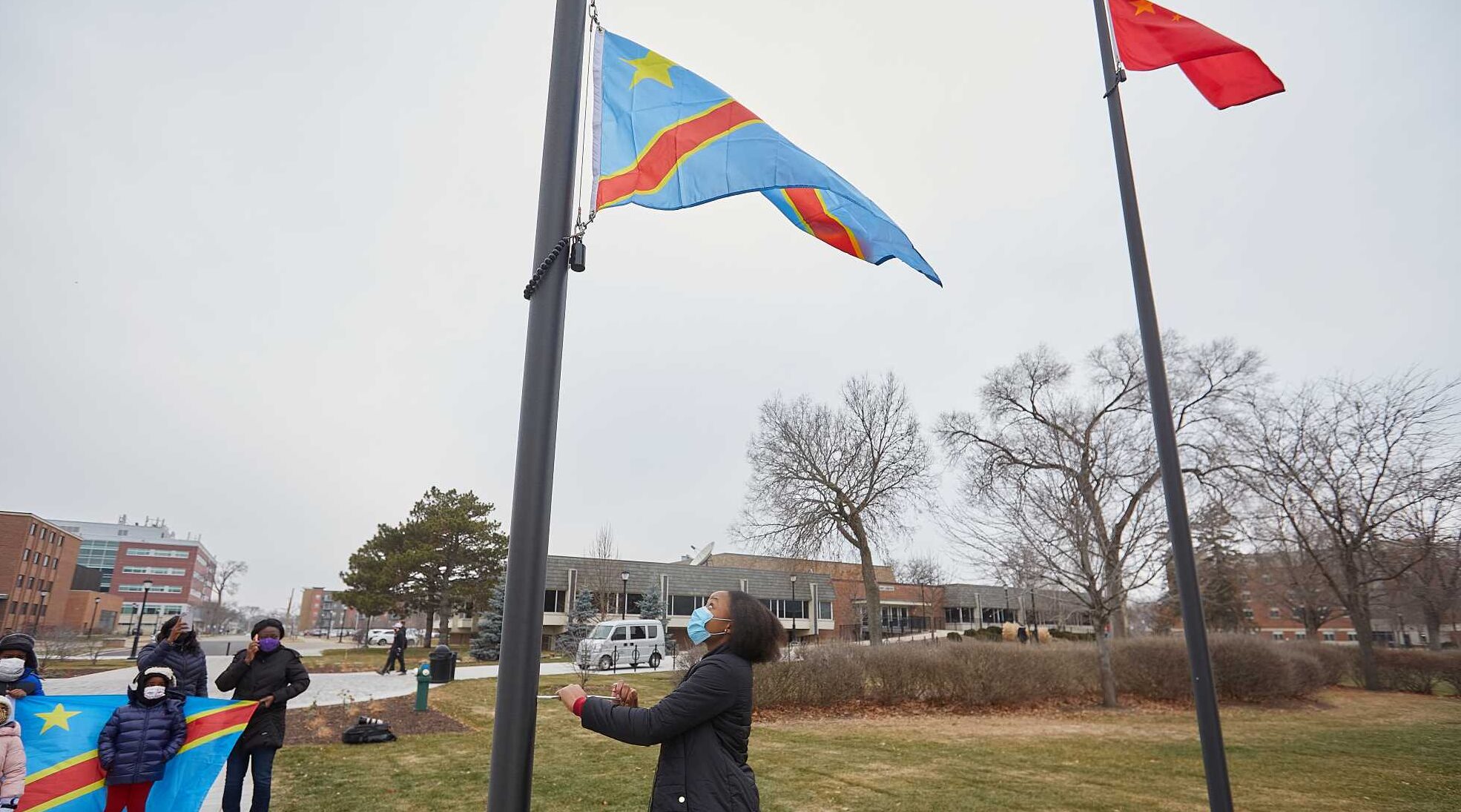 UW-La Crosse Congo alum, student revel in campus flag raising