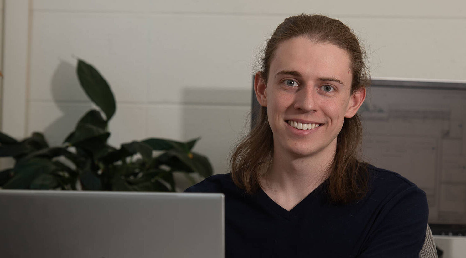 Blugold senior Carl Fossum wins state championship for COVID-19 research presentation
