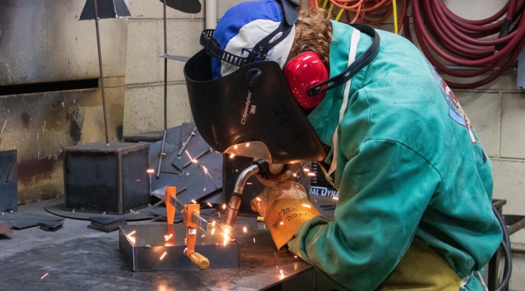 Photo of UW-Eau Claire student welding