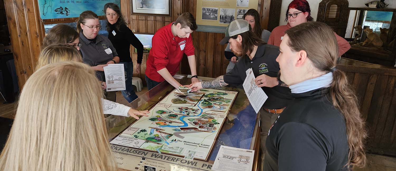 Photo of Wisconsin educators learning how to play and teach the Watershed Game.