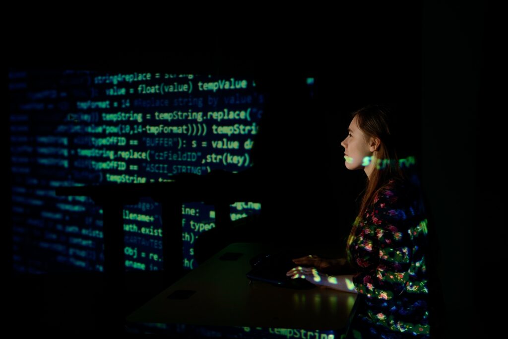 Photo of UW-Eau Claire researcher looking at screen