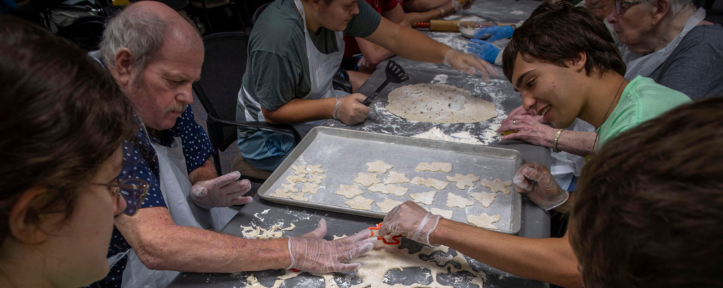 Photo of UW-Whitewater community members making cookies