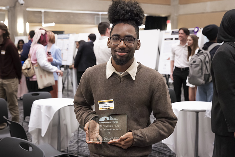 Photo: Undergraduate researcher Tierel Hood-Nellum earned the Panther Edge Award for his outstanding work in undergraduate research in 2025. He contributed to the massive Adolescent Brain Cognitive Development study, based in part at UWM. (UWM Photo/Elora Hennessey)