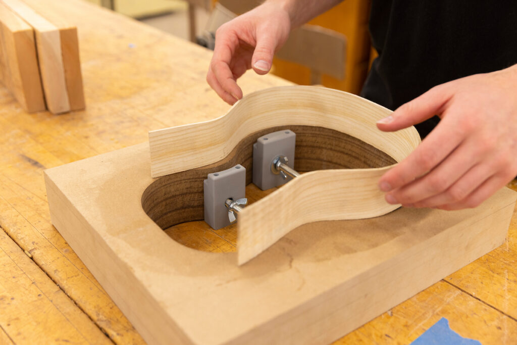 Photo: UW-Stout students build ukuleles to pay homage to Kazukiyo “Jiggs” Kuboyama, a 1957 UW-Stout industrial arts alum and master in his craft who was honored by the Ukulele Guild of Hawaii. Kuboyama passed away in 2019. / UW-Stout