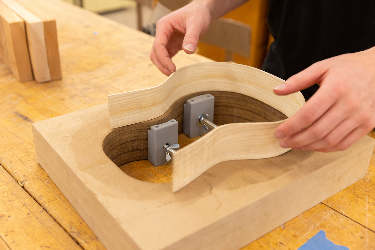 Photo: UW-Stout students build ukuleles to pay homage to Kazukiyo “Jiggs” Kuboyama, a 1957 UW-Stout industrial arts alum and master in his craft who was honored by the Ukulele Guild of Hawaii. Kuboyama passed away in 2019. / UW-Stout