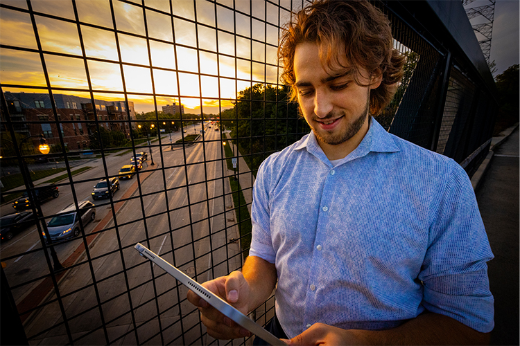 Photo: UWM PhD student Joel Roberts is the founder of Shepherd Traffic, a company that uses computer vision, geometry and smart algorithms to capture more detailed and accurate traffic data than what’s currently available. (UWM Photo/Troye Fox)