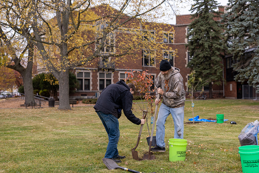 Photo of UW-Superior nontraditional student Joe Wallace planting trees in a class. Wallace graduated in May 2026.
