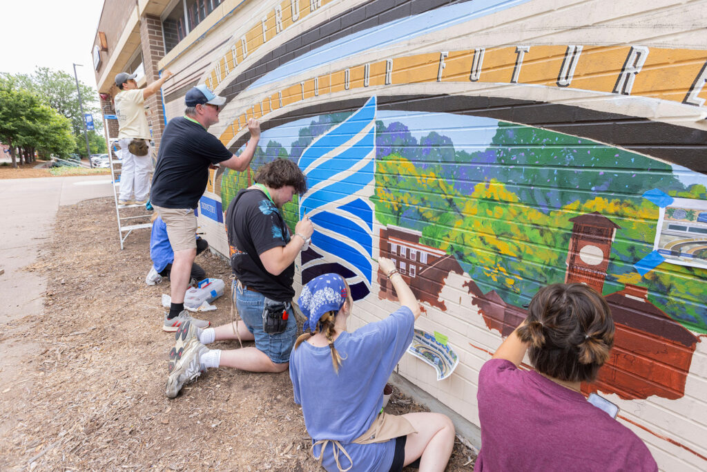 Photo of professional murals painted in various locations across Menomonie, Wisconsin.