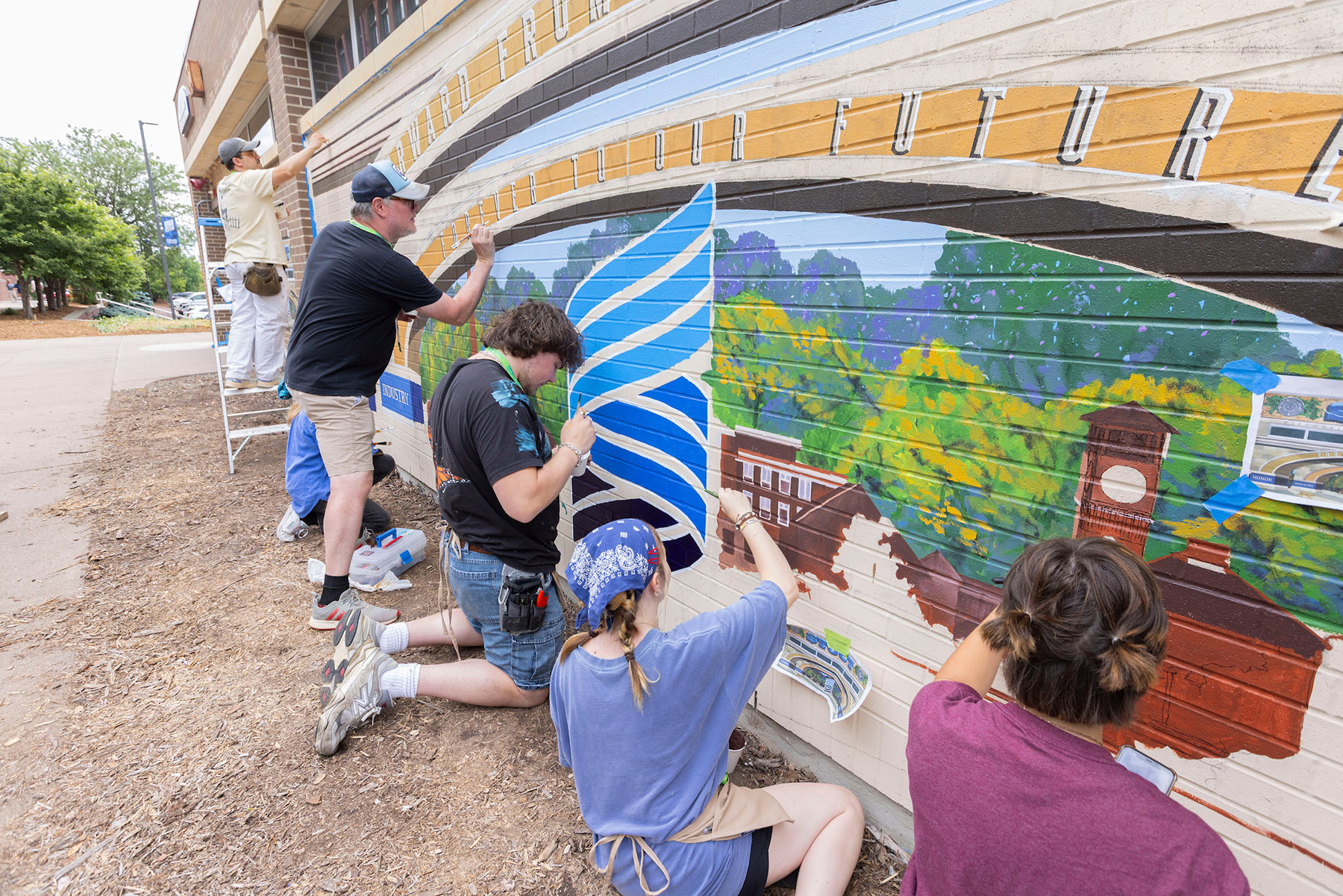 Photo of professional murals painted in various locations across Menomonie, Wisconsin.