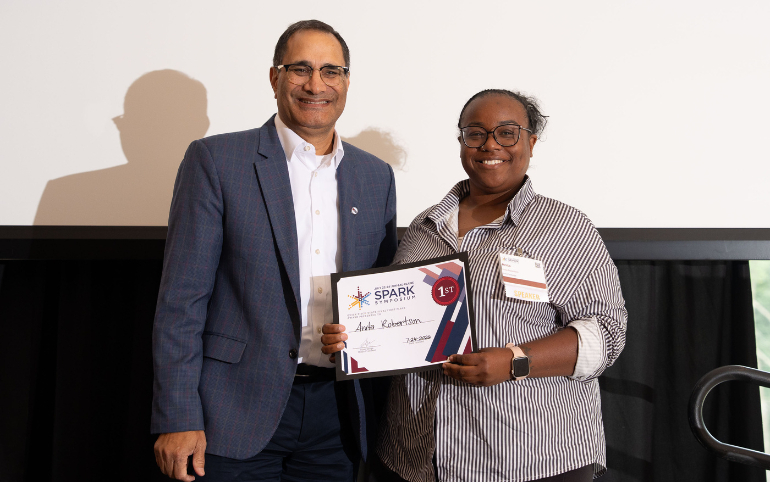 Photo: University of Wisconsin–Parkside graduate student Anita Robertson earned statewide recognition at the 2026 WiSys Quick Pitch State Final, winning both the First Place Award and the audience-selected People’s Choice Award during the annual WiSys SPARK Symposium at the University of Wisconsin-Eau Claire.
