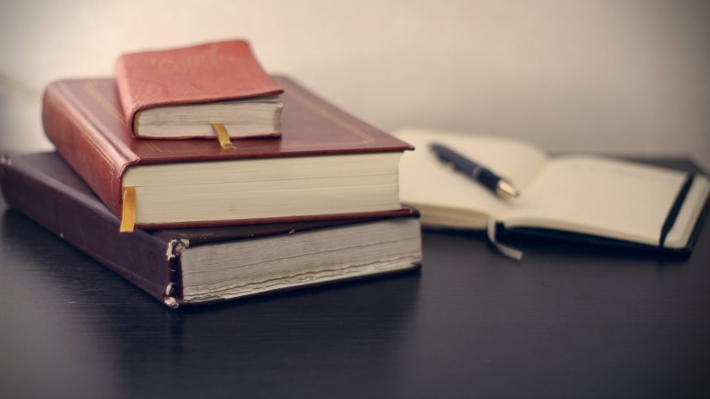 stack of three books