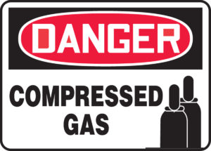 Compressed gas signage