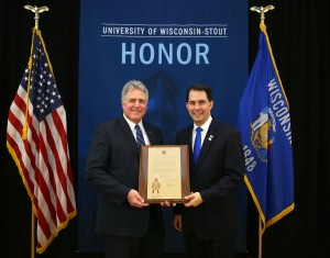 Gov. Scott Walker presents the UW-Stout proclamation to Chancellor Bob Meyer.