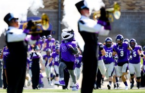 Willie Warhawk leads the team onto the field for the home opener. The University of Wisconsin-Whitewater football team defeated Finlandia University 66-3 at Perkins Stadium in Whitewater, Wis. on Saturday, September 19, 2015. (UW-Whitewater Photo/Craig Schreiner)