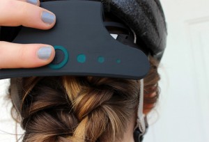 UW-Stout student Samantha Floersch designed a helmet-mounted attachment for mountain bikers that tracks location, takes vitals and plays music.