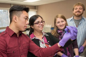 UW-Eau Claire chemistry research students working with Dr. Sanchita Hati. From left: An Nam Hodac, Dr. Sanchita Hati, Lauren Adams and Ryan Andrews.