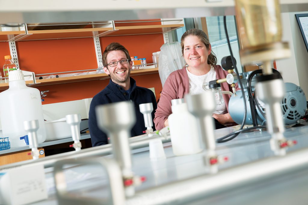 “You can never have too many water samples,” said microbiologist Sandra McLellan (right), who ships a water sample from every place she visits back to the McLellan Lab. With colleague Ryan Newton (left) she sampled water from 71 U.S. cities for a major NIH study. (UWM Photo/Troye Fox)