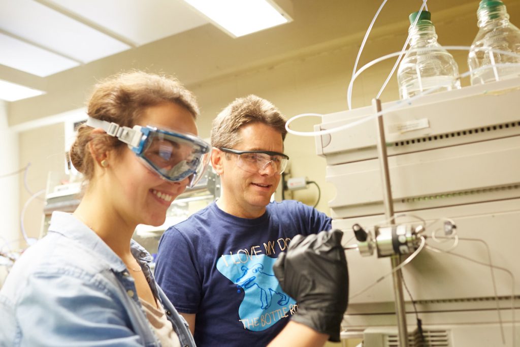 Robert McGaff, professor of Chemistry and Biochemistry, received the Innovator of the Year Award from WiSys Technology Foundation. Here he is pictured in the lab with Rachel Butler, one of his student research assistants.