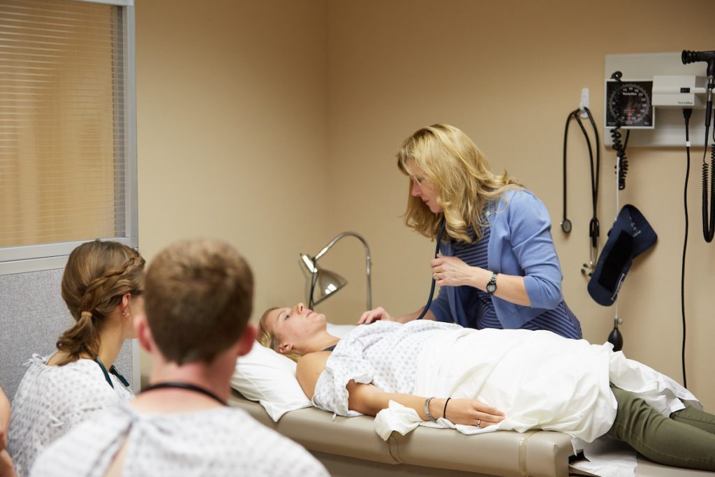 Sandra Sieck, UW-La Crosse’s PA program director, demonstrates during a class in the Physician Assistant Studies program.