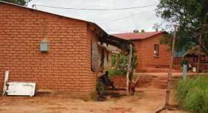 Rural homes in Mzuzu, Malawi, receive electricity from generators built by resident Hastings Mkwandwire, who participated in a U.S. leadership program at UW-Stout.