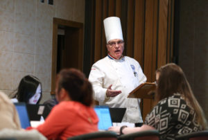 Professor Phil McGuirk teaches a Principles of Food Service Operations class in Heritage Hall at UW-Stout.