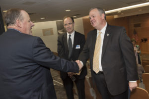 Photo of Dr. Andrew Limper, associate dean of practice transformation for Mayo Clinic Health System, Dr. Richard Helmers, regional vice president for Mayo Clinic Health System, and UW-Eau Claire Chancellor James Schmidt.