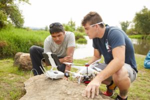 Photo of Niti Mishra, left, a UW-La Crosse assistant professor of Geography and Earth Science, who has a license to fly a drone up to 400 feet. This one is capable to flying up to 1,600 feet. Mishra is pictured with UWL senior Zachary Woodcock who is learning to fly drones while assisting a local organization with invasive species monitoring with help from Mishra.