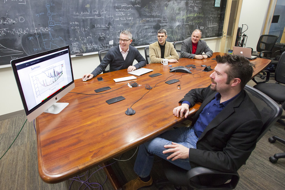 Photo of Patrick Brady, Jolien Creighton, Alan Wiseman, and Xavier Siemens, who lead UWM's LIGO team. (UWM Photo)