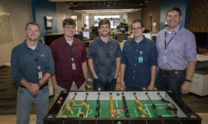 Photo of Sentry managers and student-employees from UW-Stevens Point who work and occasionally play at the Sentry IT Co-op.