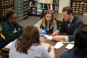 Photo of researchers conducting archival research in the Southwest Wisconsin Room.