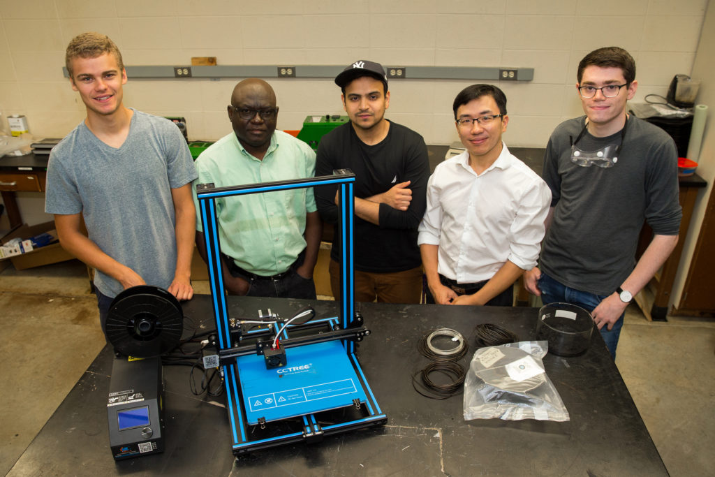 Photo of (from left) Kevin Vergenz, mechanical engineering student; Dr. John Obielodan, associate professor of mechanical engineering; Danyal Aqil, mechanical engineering student; Dr. Joseph Wu, associate professor of chemistry; and Jamison Wallace, chemistry student. Student researchers not pictured are Michael Carr, mechanical engineering student, and Zhiwei Yang, software engineering student.