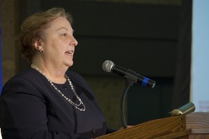 Barb Daley speaking at the podium