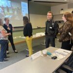 Universities of Wisconsin participants waiting to speak to UW Administration representations after the May 2, 2025, Shared Governance Council meeting at the Pyle Center in Madison, Wisconsin.