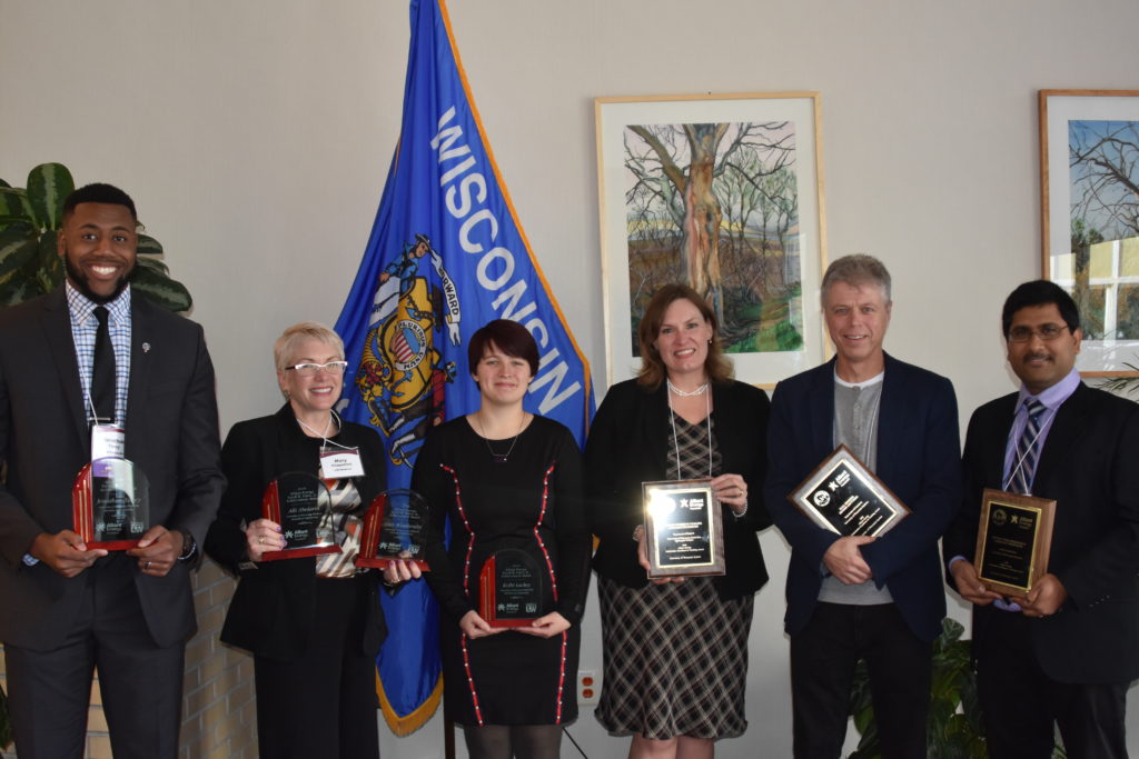 Alliant Energy Award Recipients; from left: Jonathan Yancy, Mary Fitzpatrick (Accepting awards on behalf of Alli Abolarin and Coty Weathersby), Kolbi Lackey, Valerie Murrenus Pilmaier, Paul Hooker, Muthu Venkateshwaran