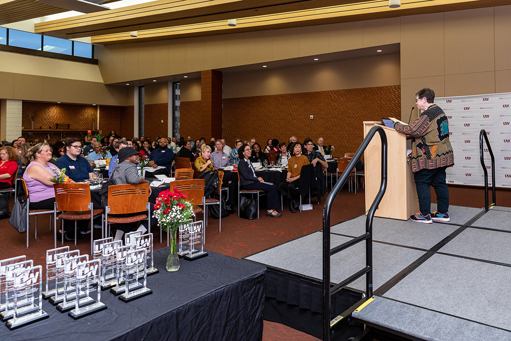 Photo of Susan Simmons, life partner of Dr. P.B. Poorman, speaking at the 2022 awards ceremony. (Photo by Hedi Rudd)